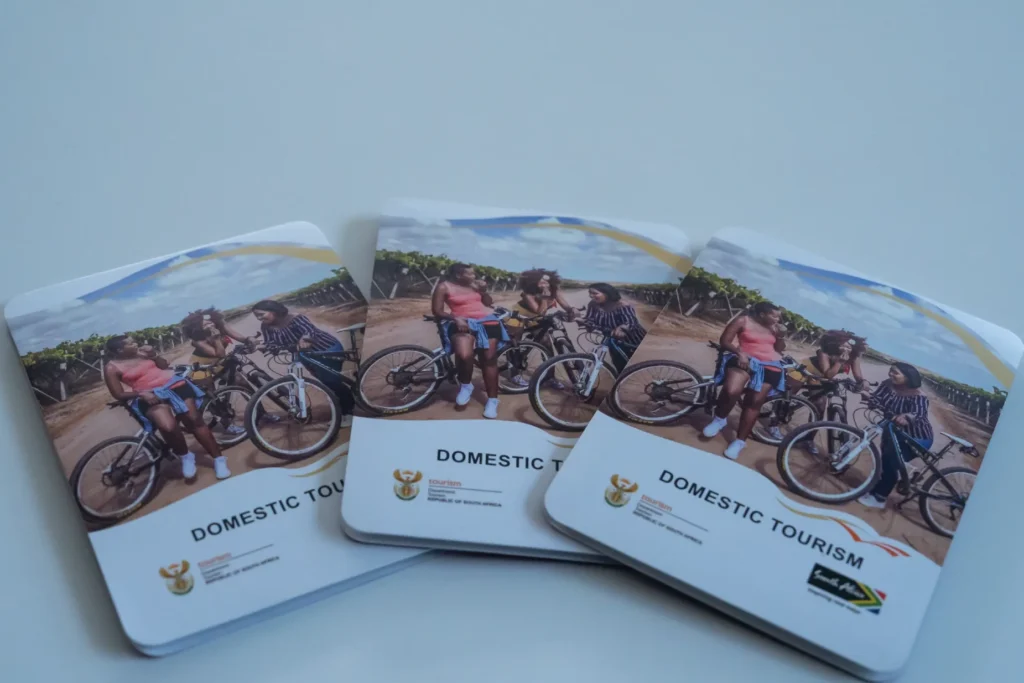 Printed Pamphlets on a table with the headings reading: Domestic Tourism