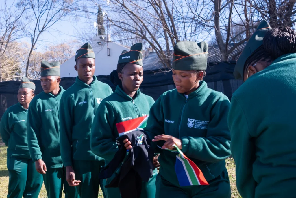 A group of young ethnic people undergoing basic millitary training